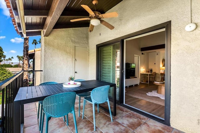 balcony featuring ceiling fan