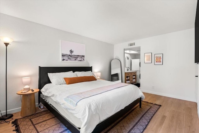 bedroom featuring light hardwood / wood-style flooring