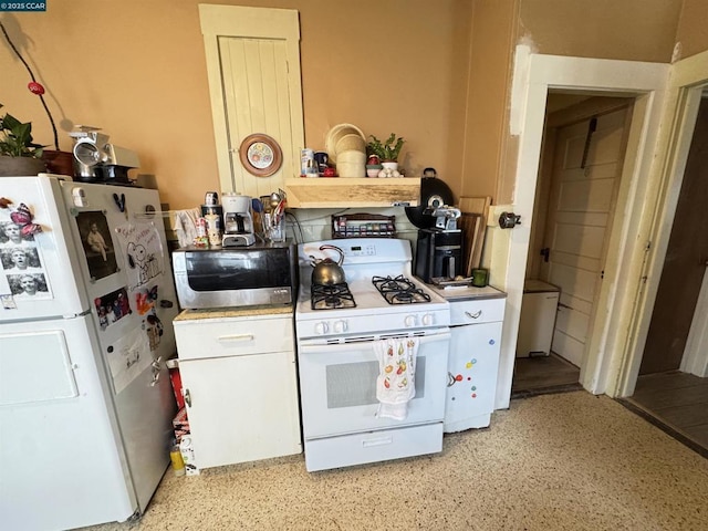 kitchen with white appliances