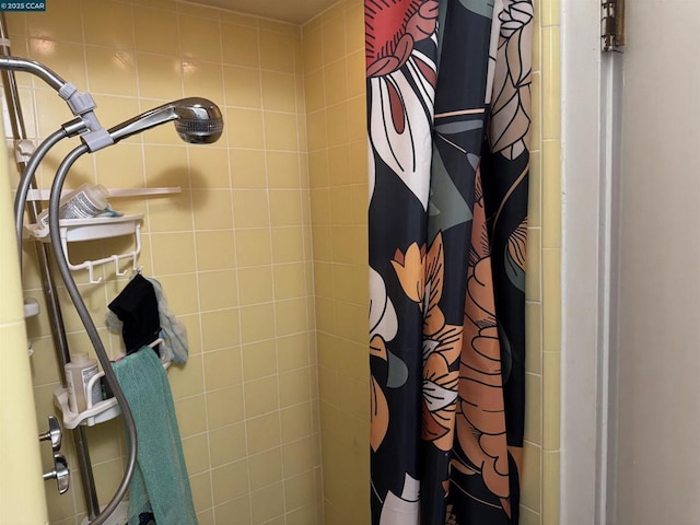 bathroom with a shower with shower curtain