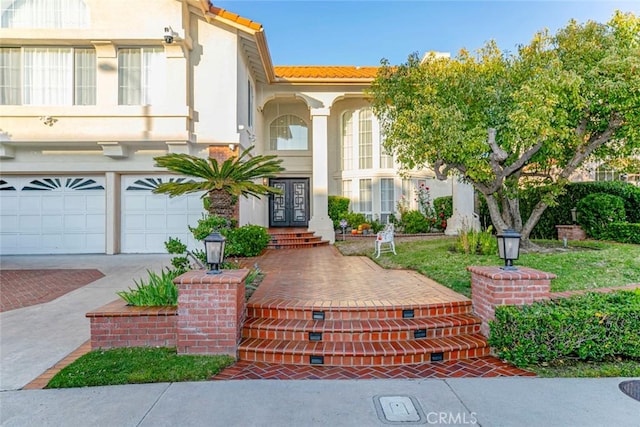 view of front of home with a garage