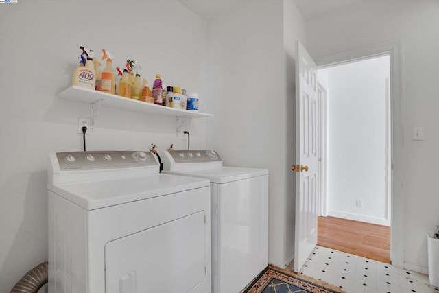 laundry room with washer and clothes dryer