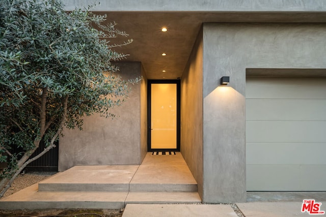 entrance to property with a garage