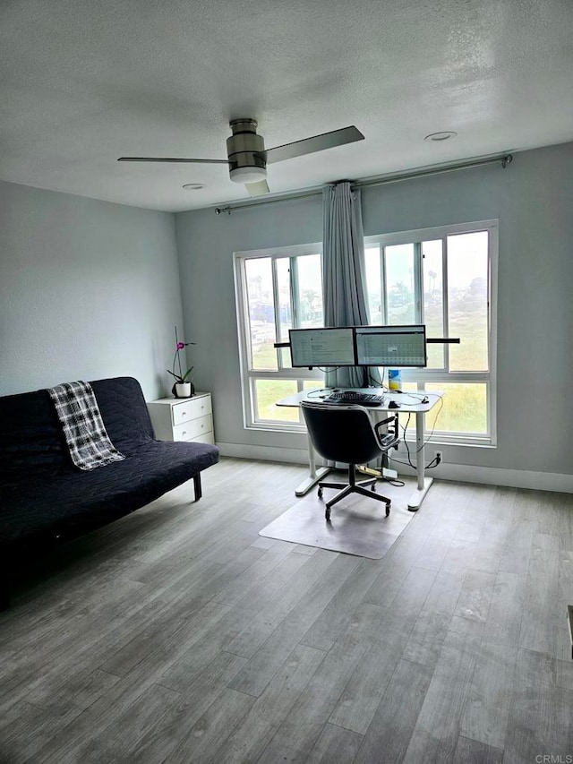 1111 Seacoast Unit 50, Imperial Beach, CA 91932 - office with a textured ceiling, wood finished floors, and a ceiling fan