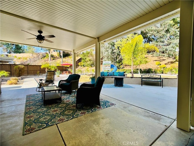 view of patio / terrace with an outdoor living space and ceiling fan