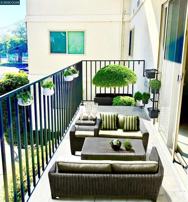 balcony featuring outdoor lounge area