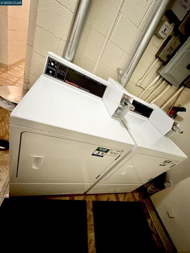 laundry room featuring washing machine and dryer