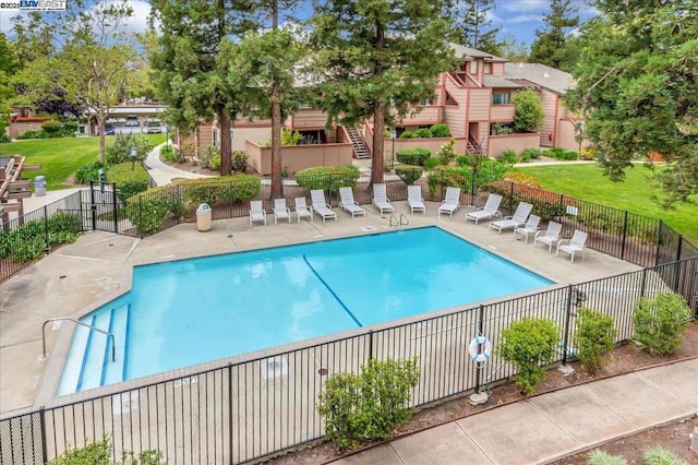 view of pool featuring a patio area