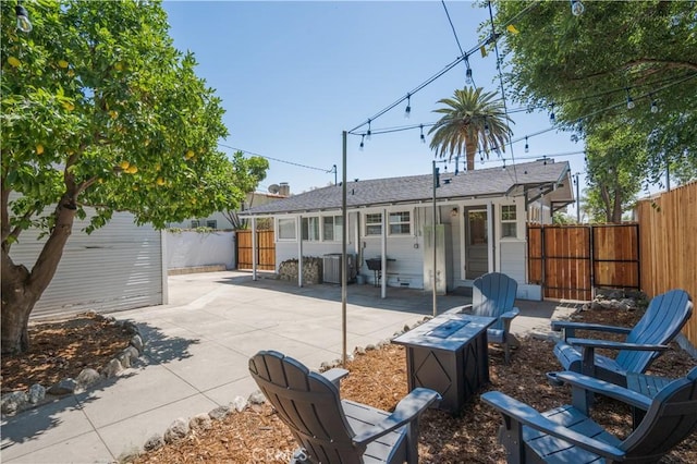 back of property featuring a patio area