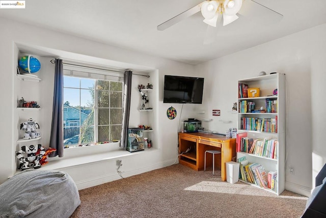 interior space featuring carpet floors and ceiling fan