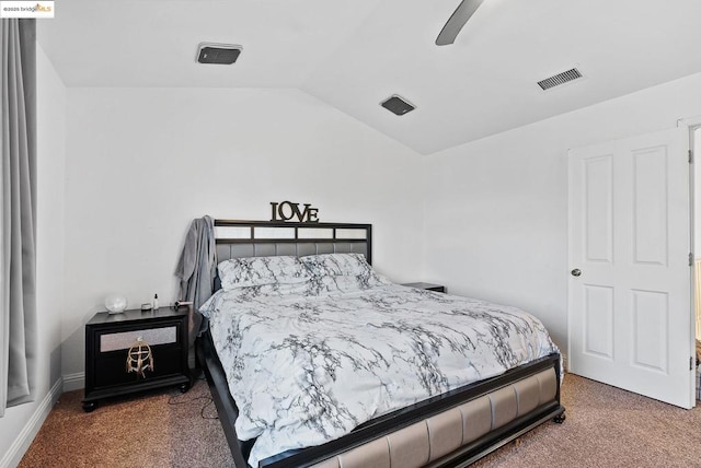 bedroom with ceiling fan, carpet, and vaulted ceiling