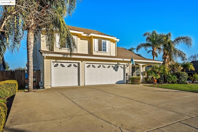 view of front of property featuring a garage