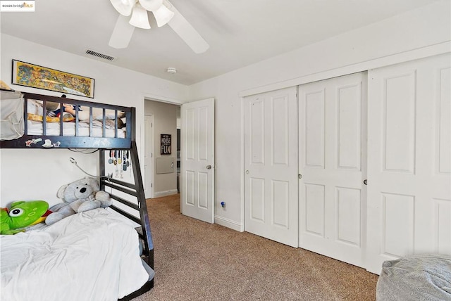 bedroom featuring carpet, a closet, and ceiling fan