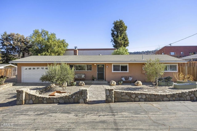 ranch-style house with a garage