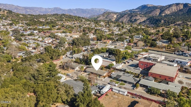 drone / aerial view featuring a mountain view