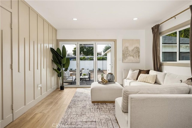 living room with light hardwood / wood-style floors