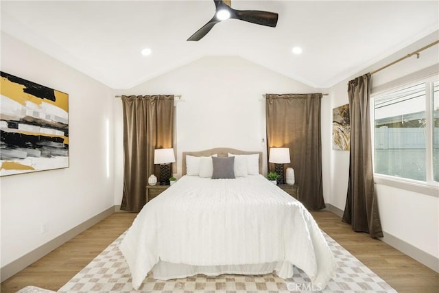 bedroom with baseboards, lofted ceiling, ceiling fan, light wood-style floors, and recessed lighting