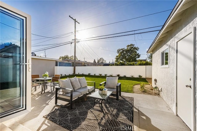 view of patio / terrace featuring outdoor lounge area and a fenced backyard