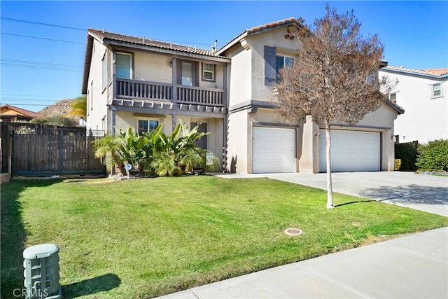 view of front of home with a front lawn and a garage