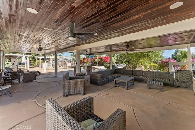 view of patio / terrace featuring ceiling fan and outdoor lounge area