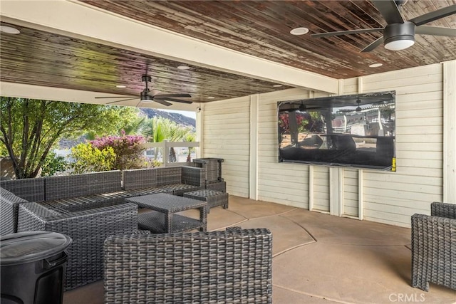 view of patio with ceiling fan and an outdoor hangout area