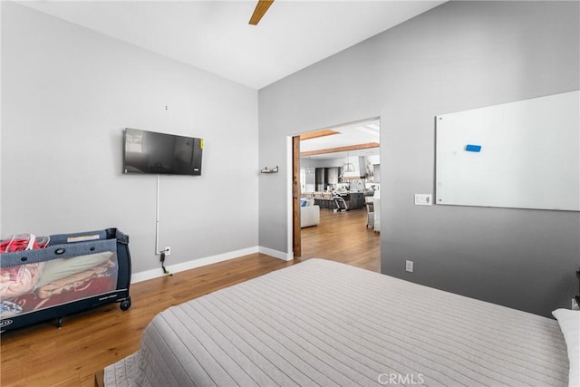 bedroom featuring ceiling fan and hardwood / wood-style flooring