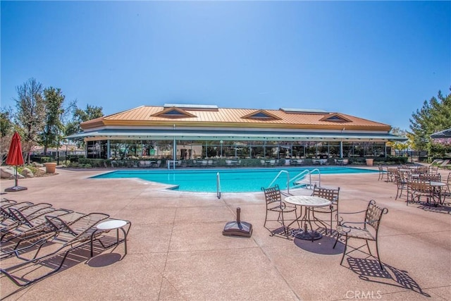 view of pool with a patio area