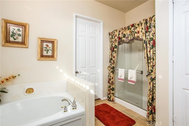 bathroom with tile patterned floors and plus walk in shower