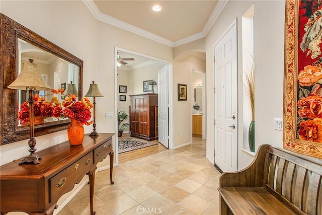 hallway featuring crown molding