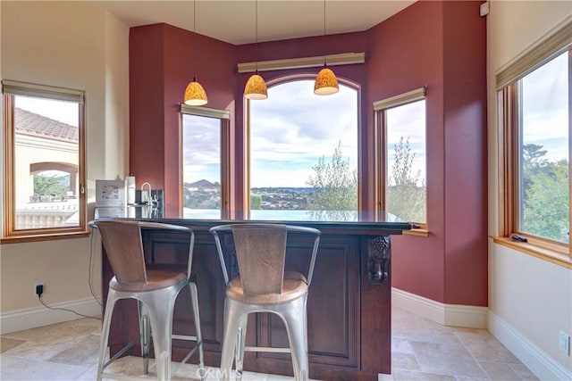 interior space with hanging light fixtures