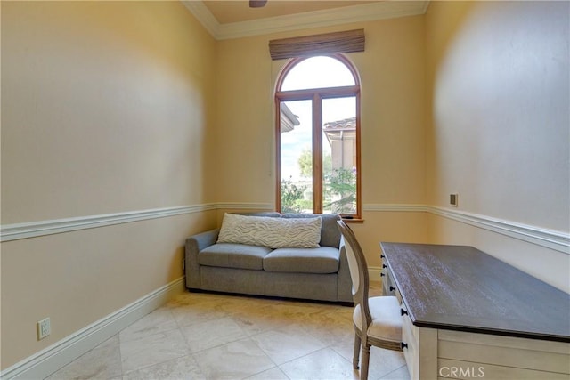 living area with ornamental molding