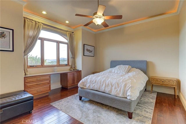 bedroom featuring ceiling fan, dark hardwood / wood-style floors, and ornamental molding