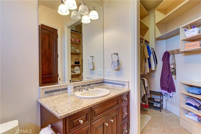 bathroom featuring vanity and built in features