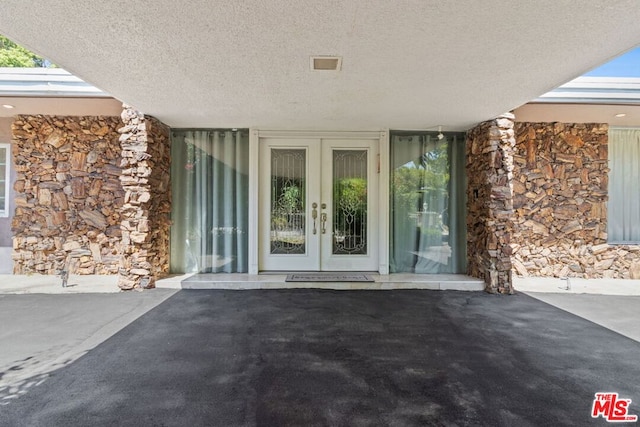 view of exterior entry with french doors