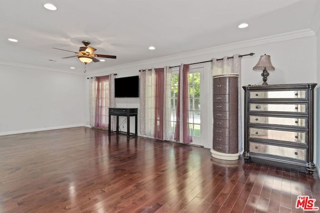 unfurnished living room with ceiling fan, ornamental molding, and dark hardwood / wood-style floors