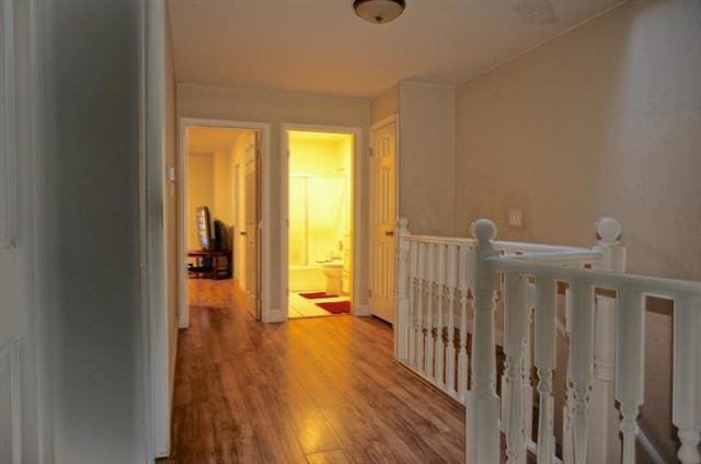 hall with light hardwood / wood-style flooring