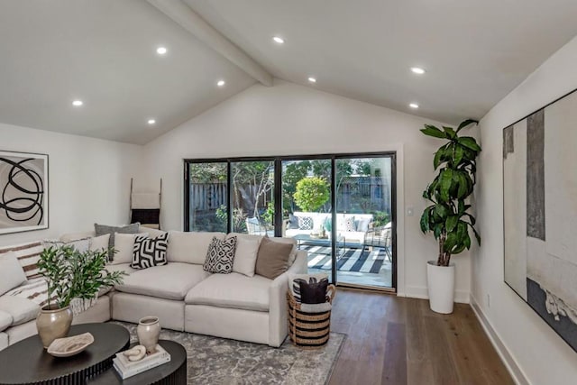 living room featuring vaulted ceiling with beams and hardwood / wood-style flooring