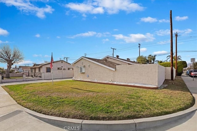 exterior space with a lawn