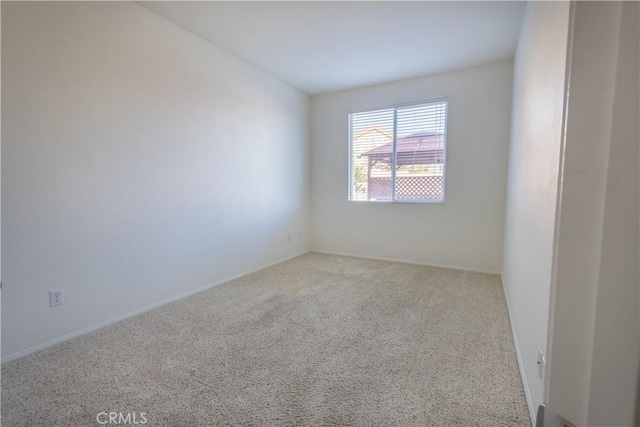 unfurnished room with carpet