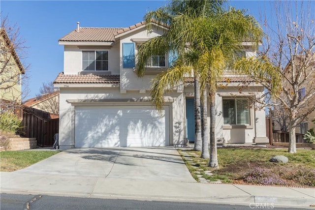 mediterranean / spanish-style home featuring a garage