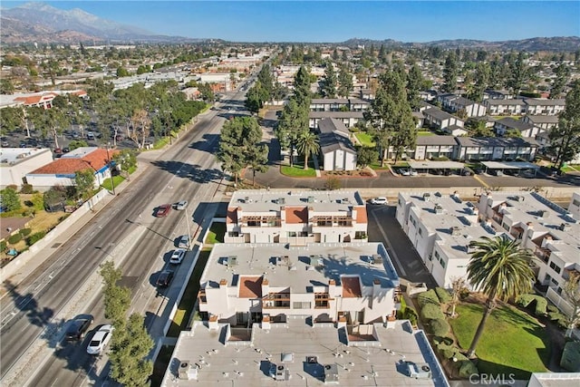 drone / aerial view featuring a mountain view