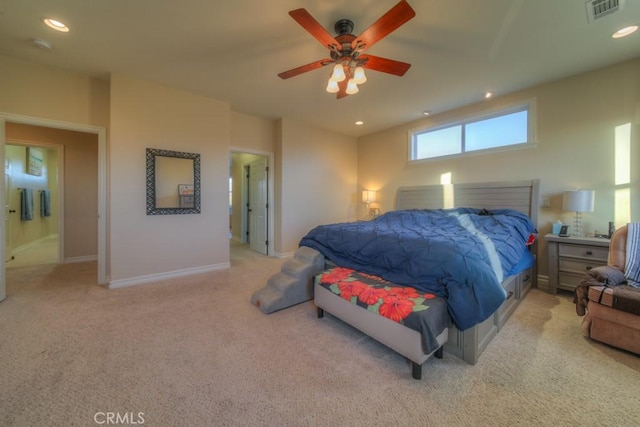 bedroom featuring ceiling fan and light colored carpet