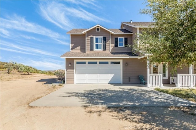 view of front of home with a garage