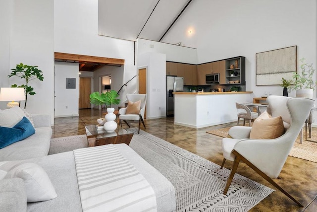 living room with a towering ceiling