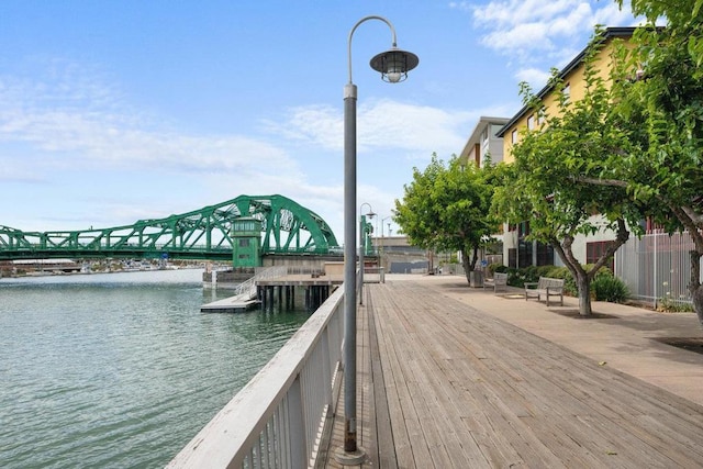 dock area with a water view