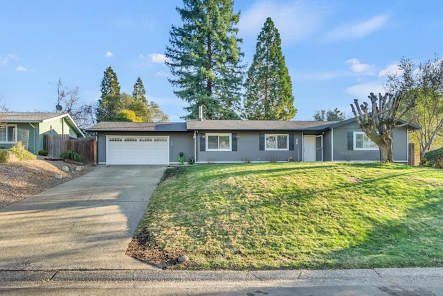 single story home featuring a front yard and a garage