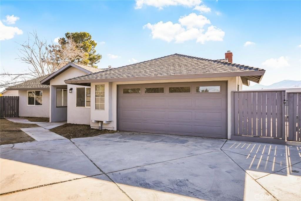 single story home with a garage