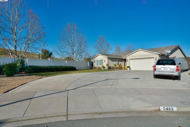 single story home with a garage