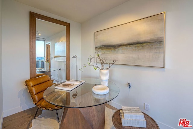 dining area featuring hardwood / wood-style flooring