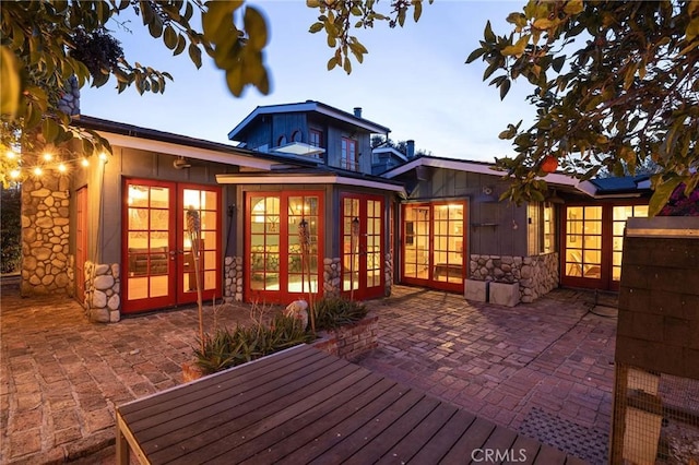 back of house with a patio area and french doors